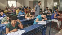 school students writing exams